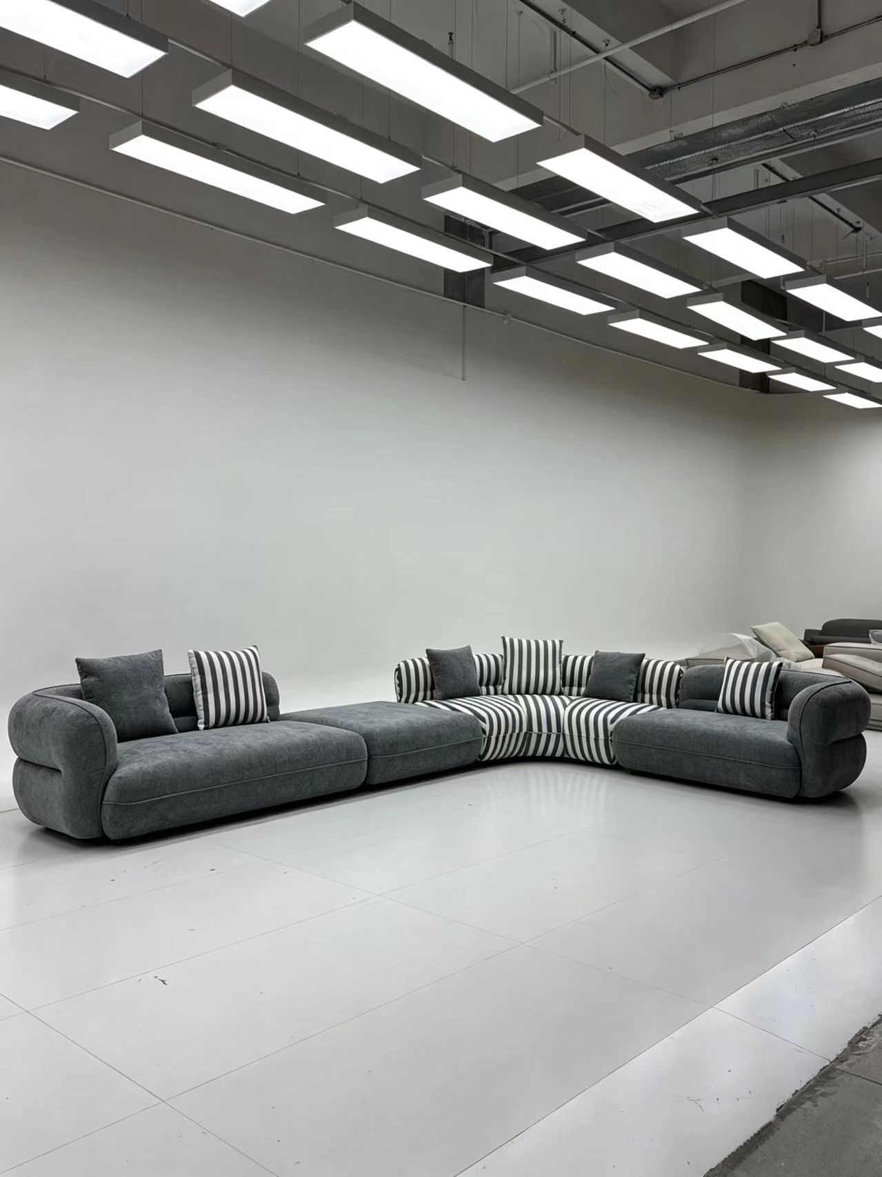 Curved Modular Fabric Sofa with Striped Cushions
