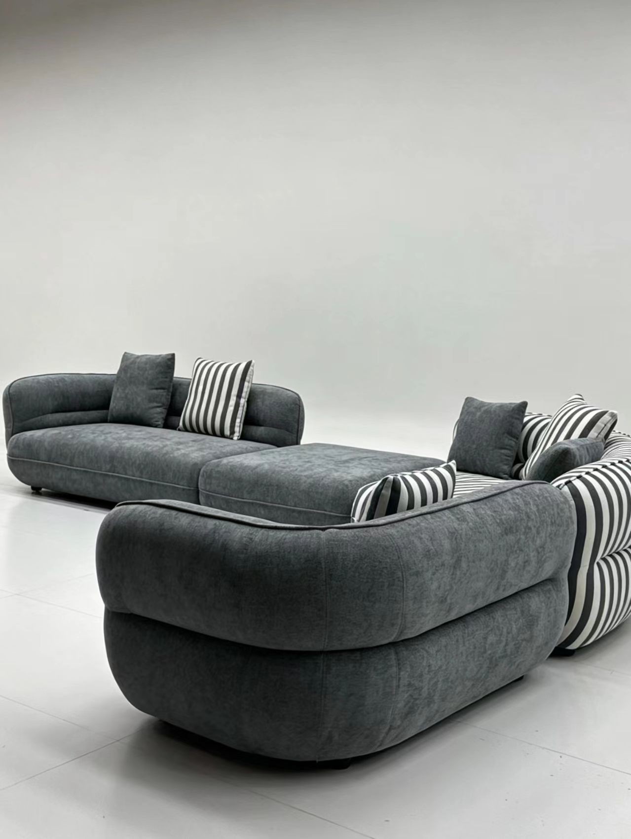 Curved Modular Fabric Sofa with Striped Cushions