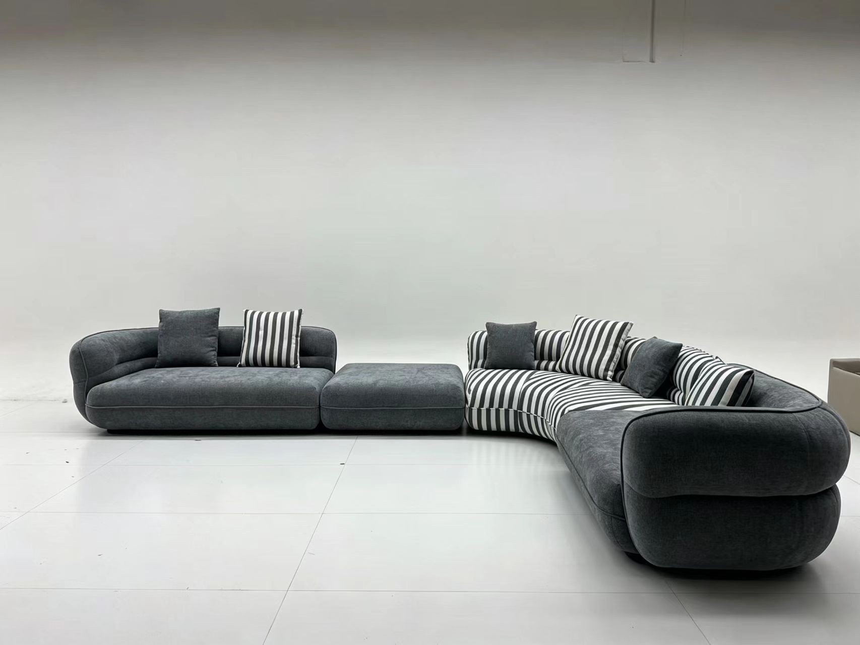 Curved Modular Fabric Sofa with Striped Cushions